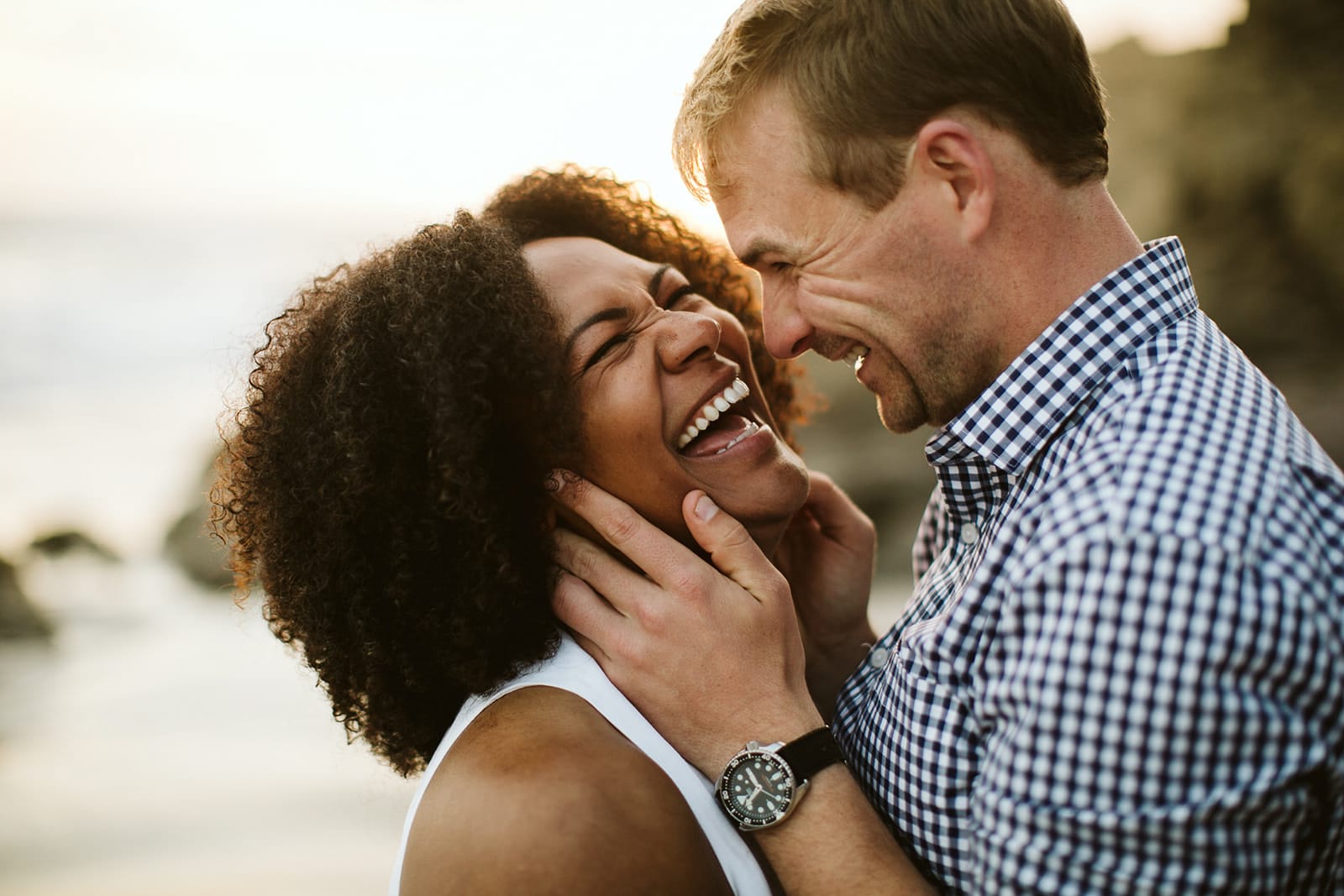Brijet + Dustin laugh during their Engagement Photo Session at Big Sur, California