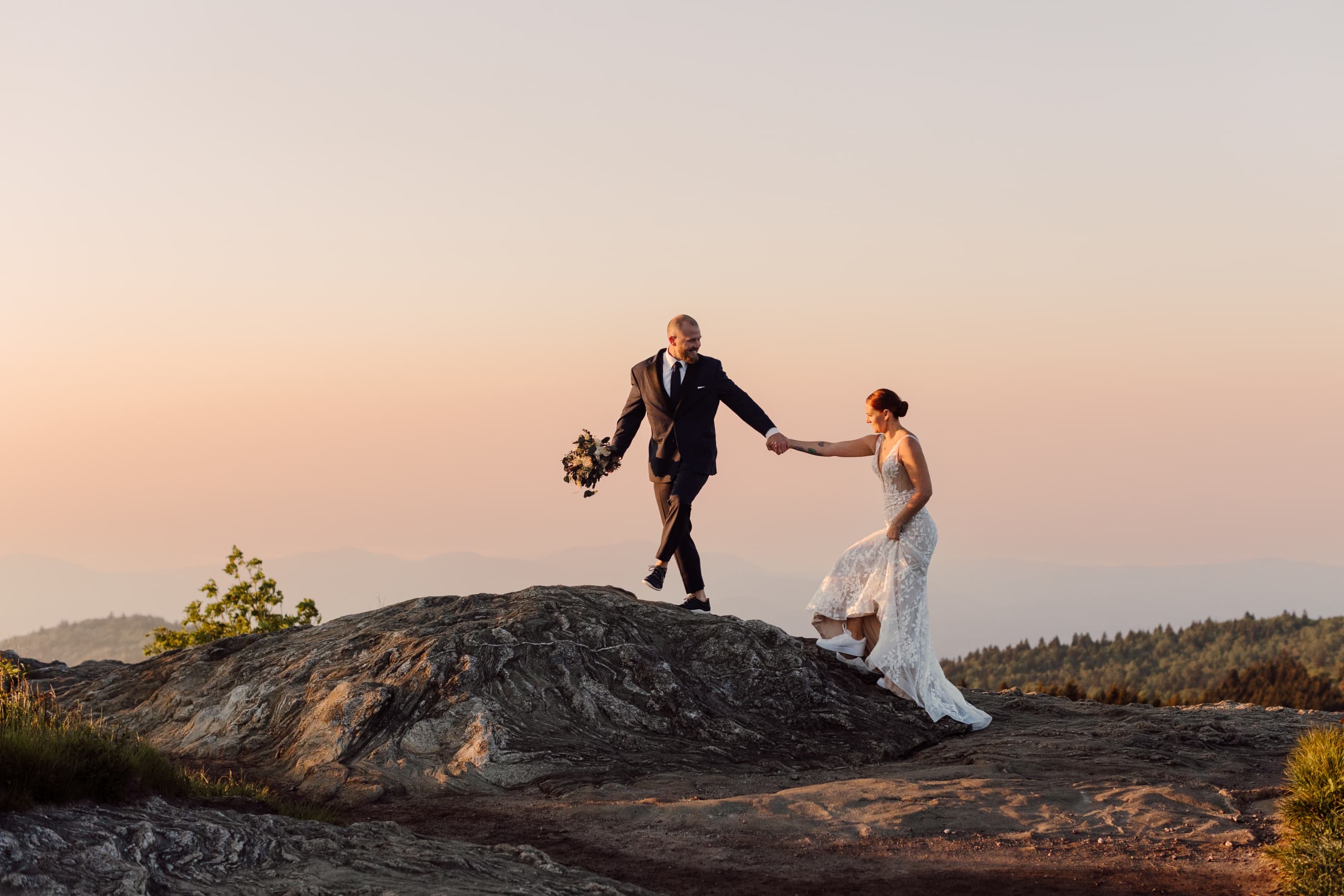 Chris leads Shea by the hand during their Sunrise Blue Ridge Parkway Elopement