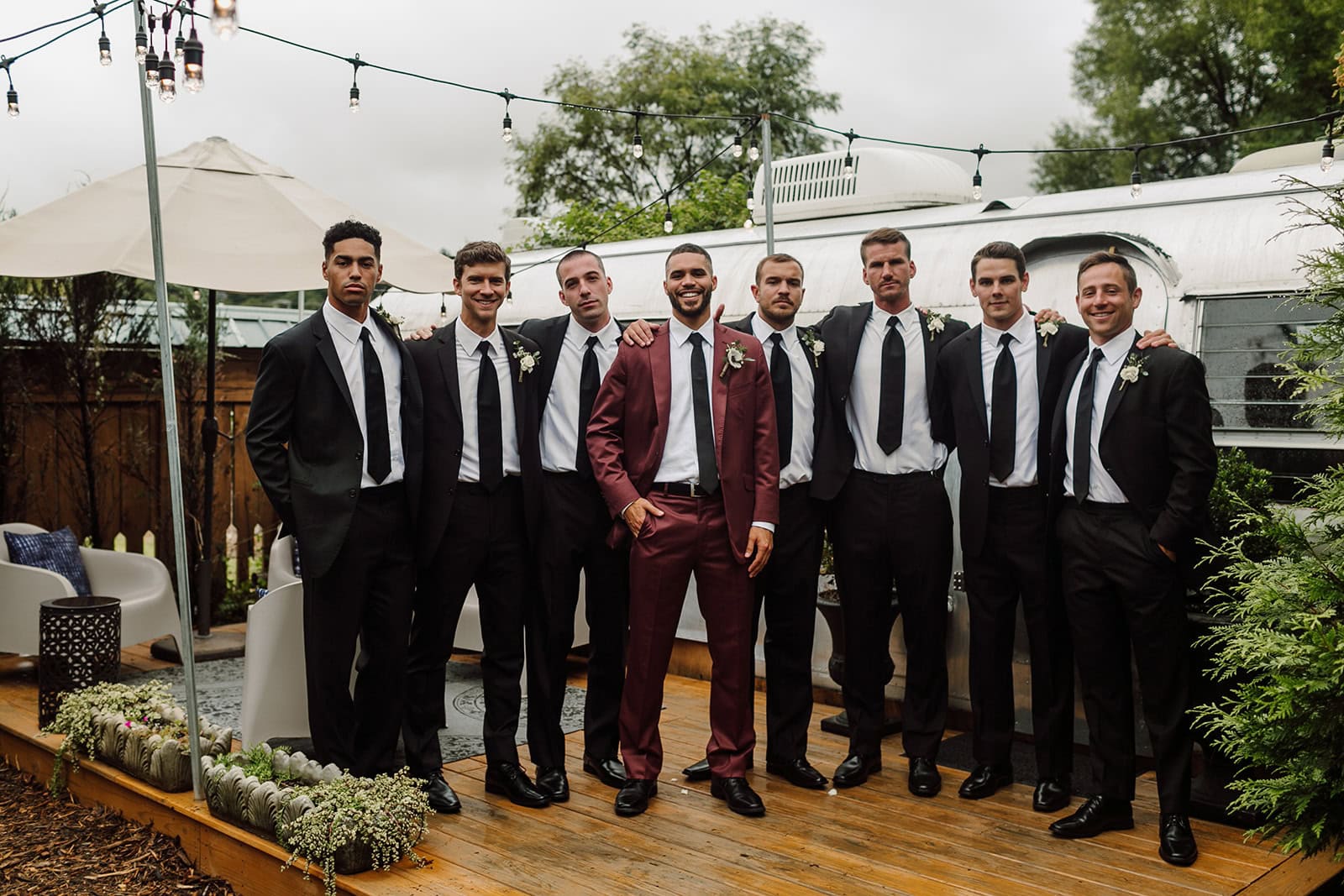 Eric and his groomsmen pose outside one of the prep spaces at Haiku in Asheville 