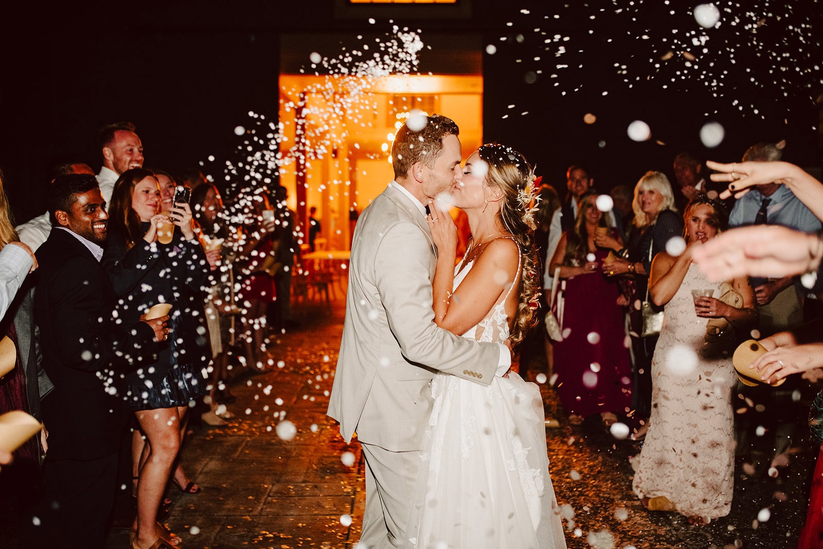 kara+kyle exit their wedding surrounded by friends and family in Mills River, NC