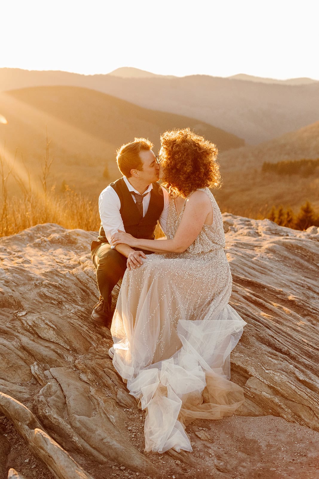 kelsey and whit kiss at sunset during their Blue Ridge Parkway Elopement